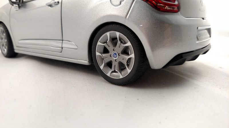 White spec is a reflection of a background light, not a paint flaw or styrofoam.